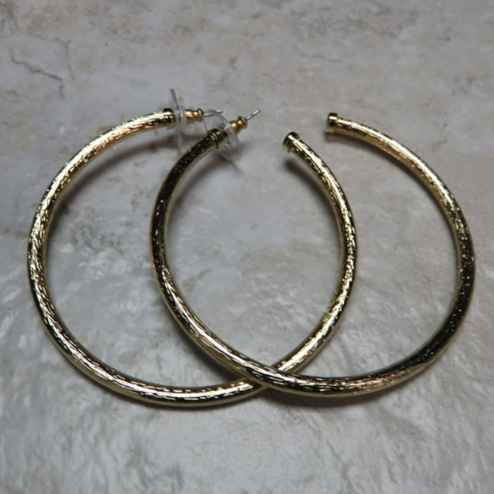 Bebe gold sparkly hoop earrings